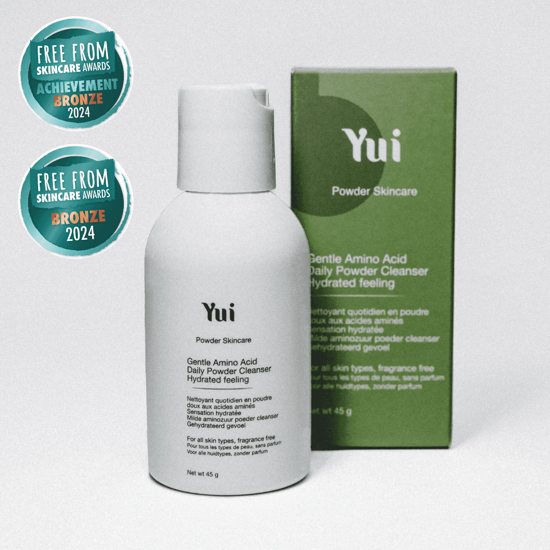 Yui Powder Cleanser with packaging and awards